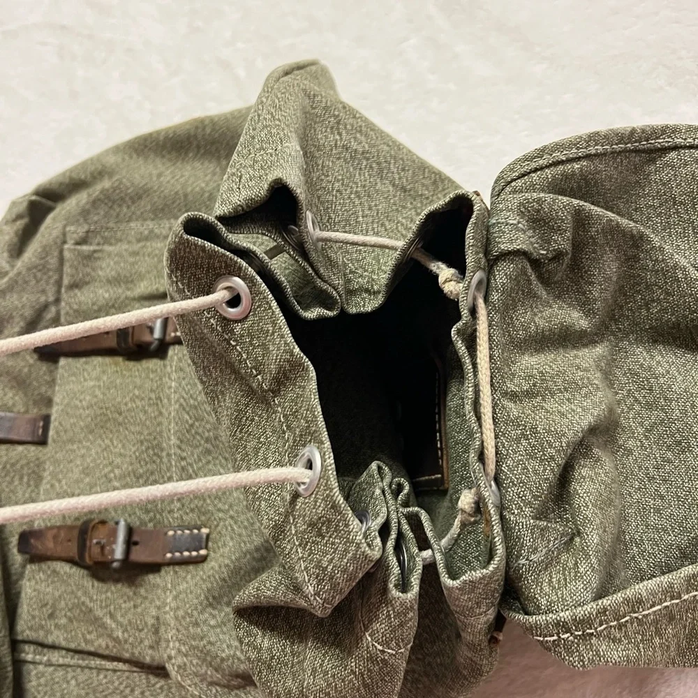 Swiss army inspired back pack leather accents